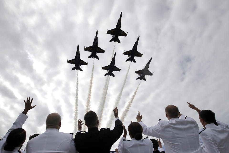 <p>U.S. Navy Blue Angels perform a flyover above graduating U.S. Naval Academy midshipmen during the academy’s graduation and commissioning ceremony in Annapolis, Md., May 26, 2017. (Photo: Patrick Semansky/AP) </p>