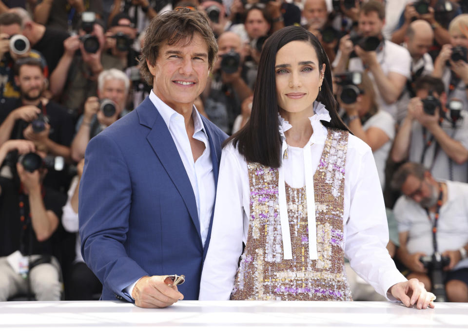 Tom Cruise, left, and Jennifer Connelly pose for photographers at the photo call for the film 'Top Gun: Maverick' at the 75th international film festival, Cannes, southern France, Wednesday, May 18, 2022. (Photo by Vianney Le Caer/Invision/AP)