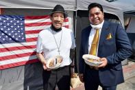 <p>Danny Trejo and Dr. Michael Everest, founder and co-chairman of the Everest Foundation, take a break from assisting homeless U.S. veterans at the VA West Los Angeles Healthcare Campus Japanese Garden to enjoy tacos from Trejos Tacos on Thursday in L.A.</p>