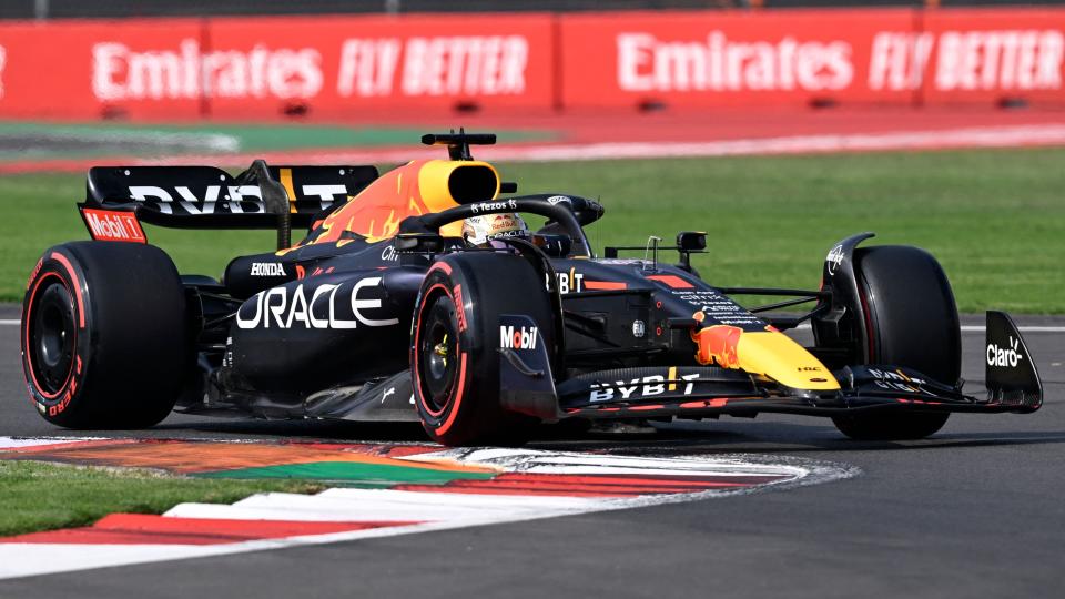  Red Bull Racing's Dutch driver Max Verstappen takes a turn out on track in his midnight blue F1 car. 