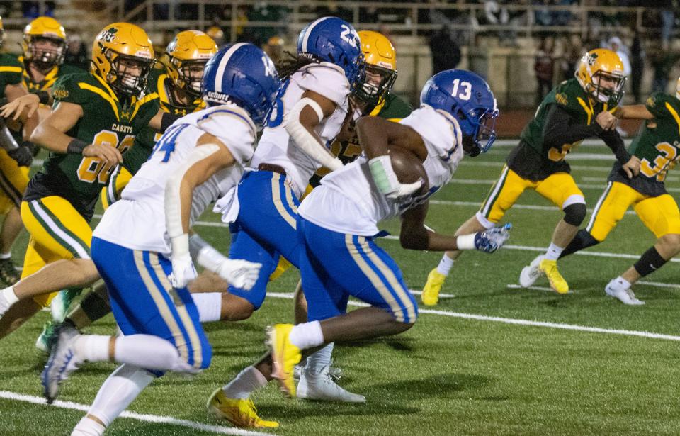 Michael Thomas III, shown returning a blocked punt for a touchdown against Red Bank Catholic last season, is one of the Shore Conference's best receivers this season.