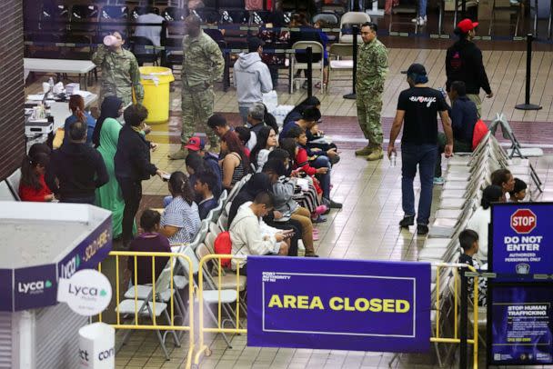 PHOTO: Migrants arriving from Texas by bus wait to be processed at the Port Authority bus terminal in New York City, U.S., May 10, 2023. REUTERS/Andrew Kelly (Andrew Kelly/Reuters)