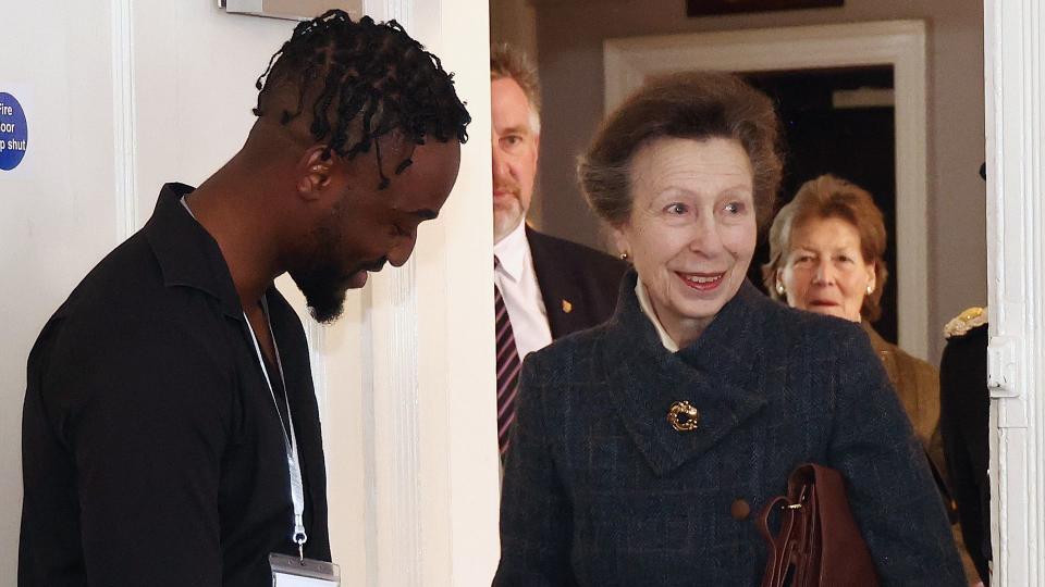 Princess Anne, Princess Royal is welcomed by Ravaun Jones, Director and Co-Founder during a visit to knife crime community group 'Off The Streets' on February 16, 2024 in Wellingborough, England.