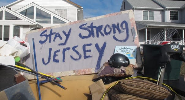 Noreaster (Residents of a flood-wrecked home in Point Pleasant Beach N.J. offer encouragement to fellow victims of Superstorm Sa