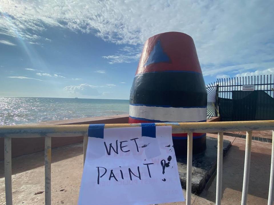 Key West on Jan. 2, 2022, began repainting the Southernmost Point buoy landmark after it was vandalized early New Year’s Day.