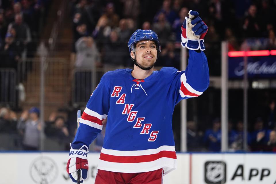 New York Rangers' Filip Chytil gestures to fans after scoring a goal during the first period of an NHL hockey game against the Vancouver Canucks Wednesday, Feb. 8, 2023, in New York. (AP Photo/Frank Franklin II)