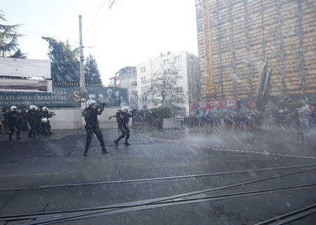 Riot police use water cannons and plastic bullets to disperse demonstrators during a protest in Istanbul, Turkey, December 20, 2015. REUTERS/Osman Orsal