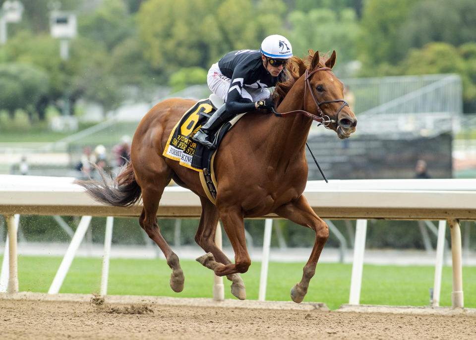 In a photo provided by Benoit Photo, Forbidden Kingdom, ridden by jockey Juan Hernandez wins the Grade II, $400,000 San Felipe Stakes horse race, Saturday, March 5, 2022 at Santa Anita Park in Arcadia, Calif.(Benoit Photo via AP)