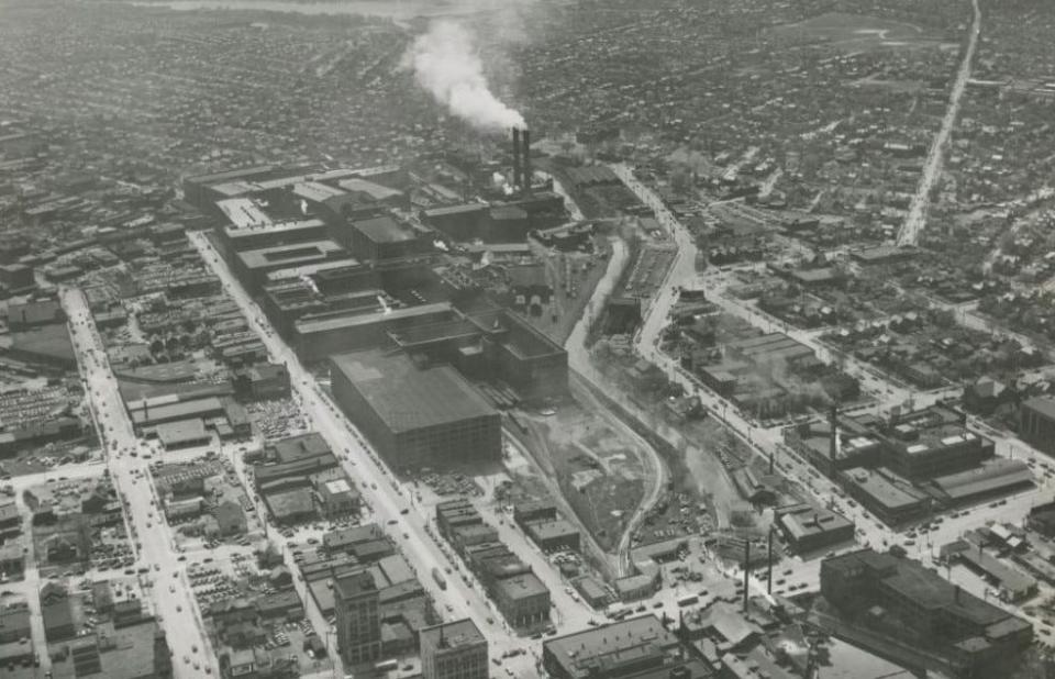 Smoke billows from the B.F. Goodrich Co. smokestacks in this 1941 aerial photo of the rubber factory in downtown Akron.