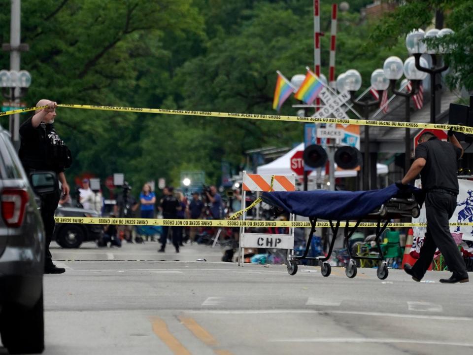 A stretcher is seen after a mass shooting at the Highland Park Fourth of July parade in downtown Highland Park, Ill.