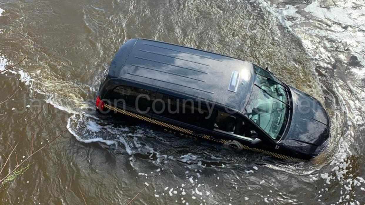 <div>The vehicle in the Rock River. COURTESY: Jefferson County Scanner</div>