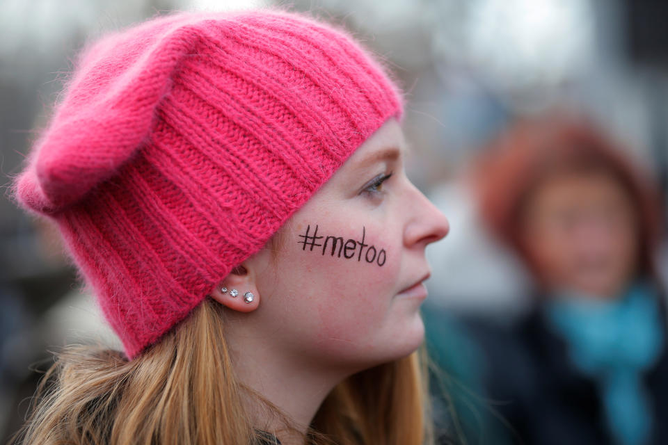 <p>Caitlyn MacGregor, with “#metoo” written on her face and wearing a pink “pussyhat”, attends the second annual Women’s March in Cambridge, Mass., Jan. 20, 2018. (Photo: Brian Snyder/Reuters) </p>