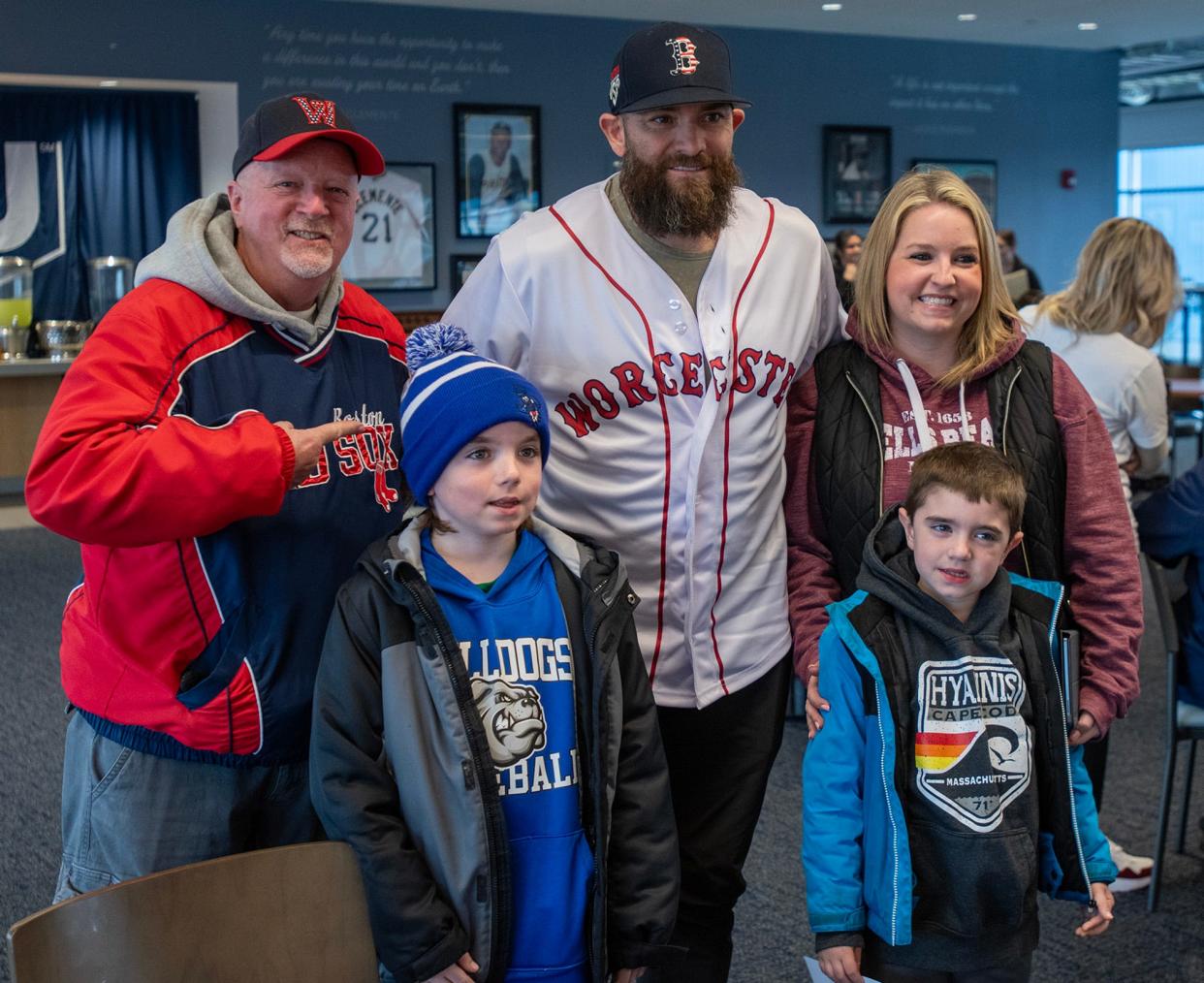 Teacher Janna Krafve, right, meets Red Sox star Jonny Gomes with her father, Dave Goodale, left, and sons Owen, 10, and Liam, 8, on Teacher Appreciation Day at Polar Park Thursday. Krafve teaches at Clinton Elementary School.