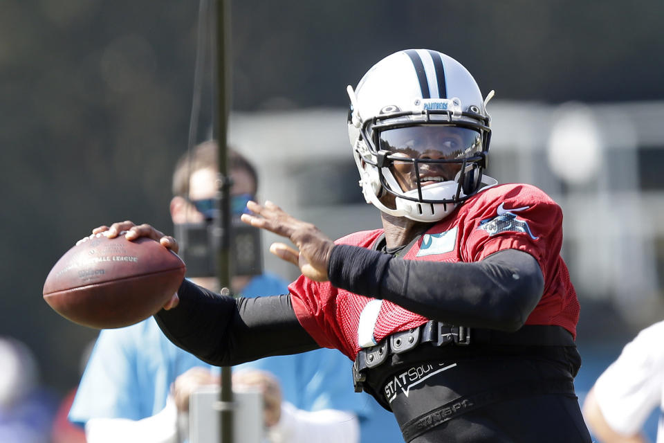 Carolina Panthers quarterback Cam Newton passes during an NFL football training camp with the Buffalo Bills in Spartanburg, S.C., Tuesday, Aug. 13, 2019. (AP Photo/Gerry Broome)