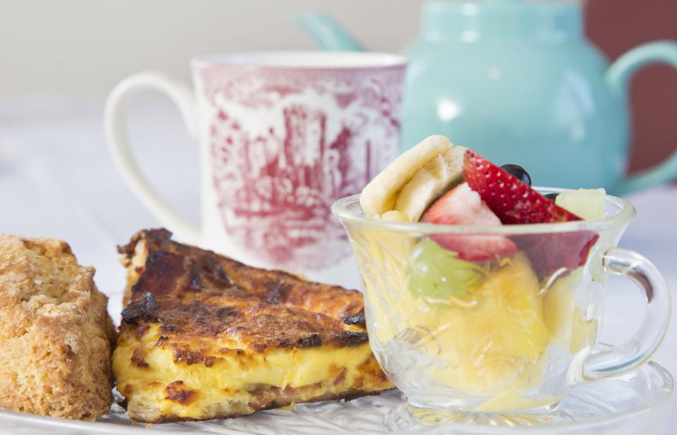 Quiche Lorraine with a cream scone from Cambridge Tea House photographed in April, 2021