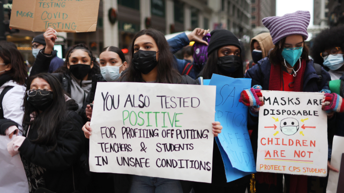CHICAGO, ILLINOIS - JANUARY 14: Public school students protest outside of the Chicago Public Schools headquarters after walking out of their classrooms on January 14, 2022 in Chicago, Illinois. The students walked out of class to demand a voice in the ongoing battle between the school district and the teacher's union over COVID-19 safety measures. (Photo by Scott Olson/Getty Images) <span class="copyright">(Photo by Scott Olson/Getty Images)</span>