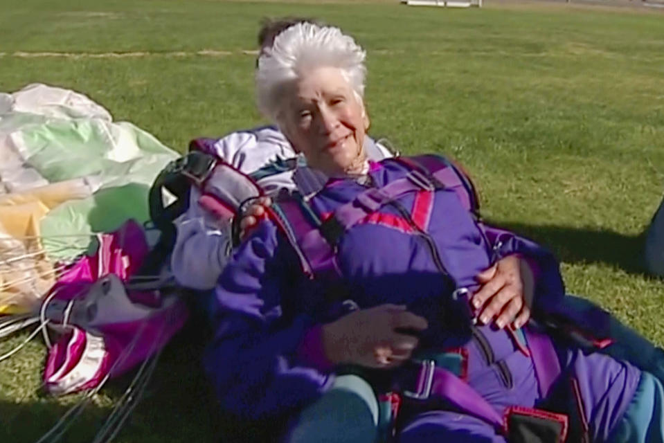 In this image made from video, Clare Nowland reacts following her skydive in Canberra, Australia April 6, 2008. Nowland, now 95, was in critical condition Friday, May 19, 2023, two days after police shocked her with a stun gun as she approached them with a walking frame and a steak knife in an Australian nursing home. (Australian Broadcasting Corp. via AP)