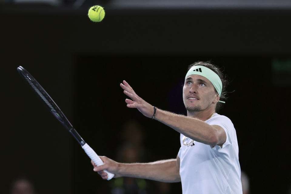 Alexander Zverev of Germany plays a forehand return to Daniil Medvedev of Russia during their semifinal at the Australian Open tennis championships at Melbourne Park, Melbourne, Australia, Friday, Jan. 26, 2024. (AP Photo/Asanka Brendon Ratnayake)