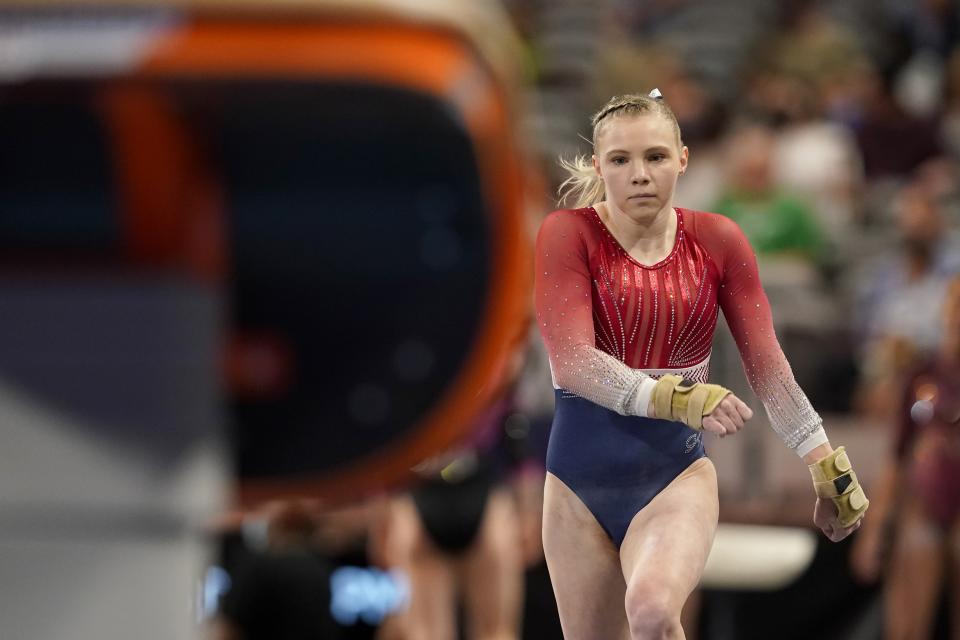 Jade Carey takes a practice run at the vault during warmups before the U.S. Gymnastics Championships, Sunday, June 6, 2021, in Fort Worth, Texas. (AP Photo/Tony Gutierrez)