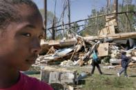 Shawtna Mathews, 13, is lucky to be alive after a tornado destroyed her home in Gloucester, Virginia. The worst tornadoes to hit parts of the United States in decades have left 44 people dead, stripping roofs off houses and tossing mobile homes into the air like toys, emergency officials said Sunday