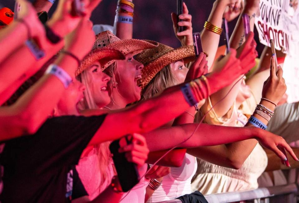 Fans cheer as Luke Combs walks by during his performance at Bank of America Stadium on Saturday, July 15, 2023.