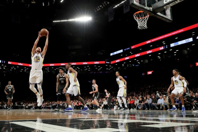 Stephen Curry of the Golden State Warriors staels a pass against the Brooklyn Nets at Barclays Center