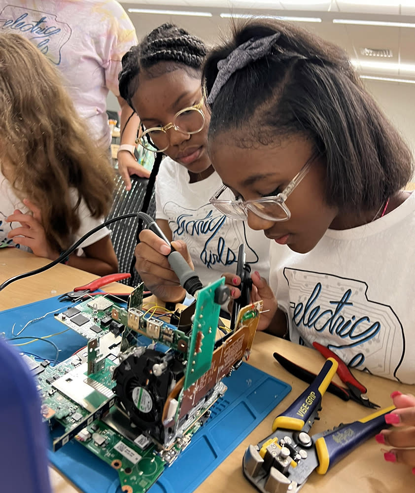 Working on a soldering project at Electric Girls program in New Orleans. (Electric Girls)