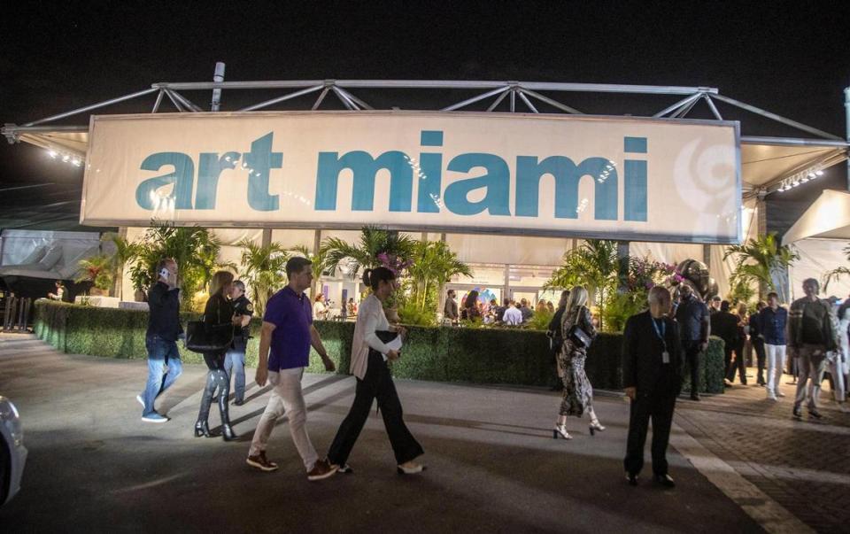 VIP guests arrive at the Art Miami fair at 1 Herald Plaza in downtown Miami on Nov. 30, 2021 as Miami Art Week begins.