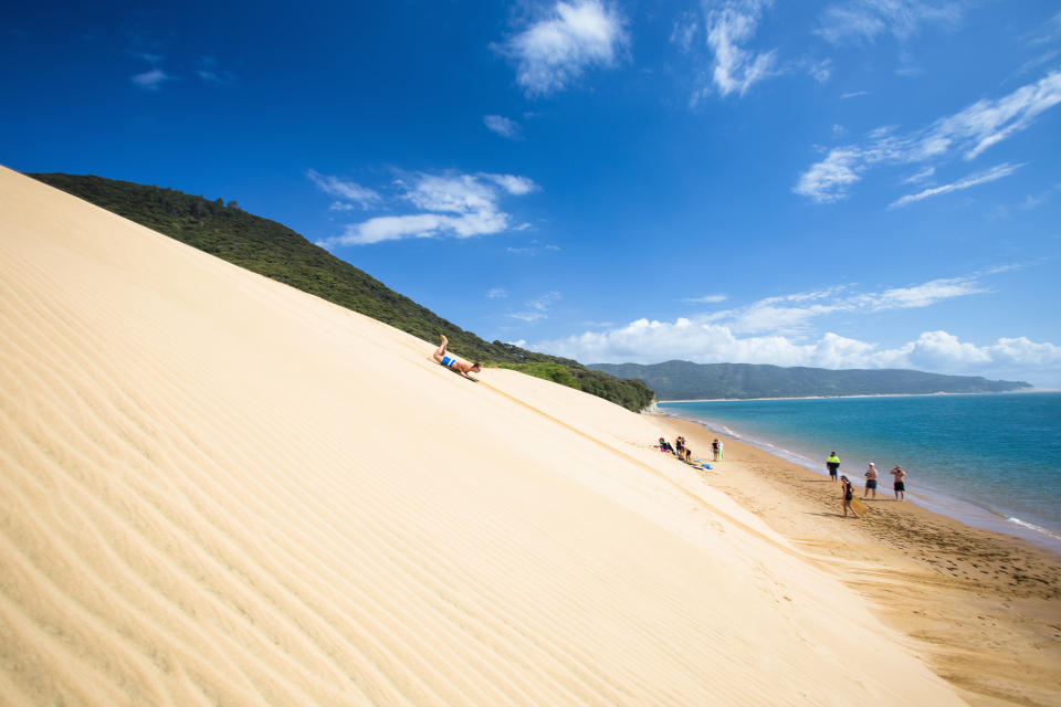 Have you ever <a href="http://www.newzealand.com/us/plan/business/cape-reinga--sandboarding-and-90-mile-beach-day-tour/" target="_blank">surfed&nbsp;down sand dunes into the sea</a>?&nbsp;(Hint: It totally beats going to the gym.)