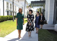 For the second day of Japanese Prime Minister Shinzo Abe and his wife Akie Abe’s visit to the White House visit, Melania Trump dressed in a forest green shirt dress in Palm Beach. [Photo: Getty]