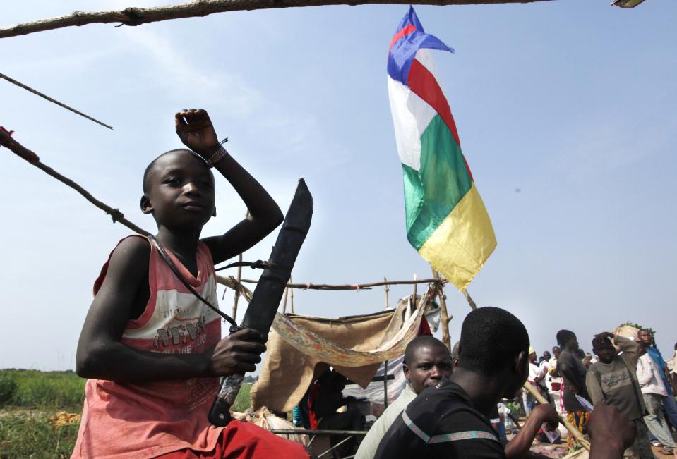 A child holds a machete in Bangui