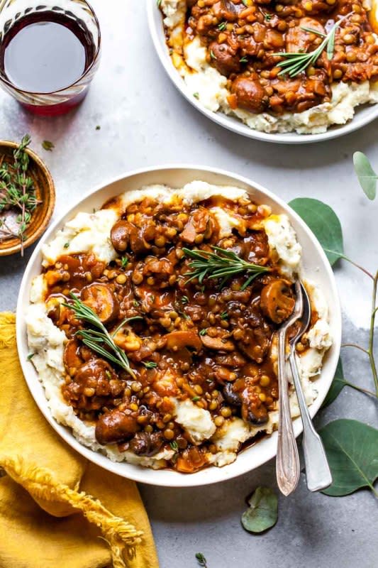 <p>Dishing Out Health</p><p>Lentil and mushroom stew over potato and parsnip mash is a hearty vegetarian meal the whole family will love. Fiber-rich and decadently delicious, this recipe will satisfy even the most devout carnivores.</p><p><strong>Get the recipe: <a href="https://dishingouthealth.com/lentil-and-mushroom-stew-over-potato-parsnip-mash/" rel="nofollow noopener" target="_blank" data-ylk="slk:Lentil and Mushroom Stew Over Potato Parsnip Mash;elm:context_link;itc:0;sec:content-canvas" class="link ">Lentil and Mushroom Stew Over Potato Parsnip Mash</a></strong></p><p><strong>Related: <a href="https://www.yahoo.com/lifestyle/35-foolproof-set-forget-crock-164443300.html" data-ylk="slk:35 Best Crock Pot Potato Recipes;elm:context_link;itc:0;sec:content-canvas;outcm:mb_qualified_link;_E:mb_qualified_link;ct:story;" class="link  yahoo-link">35 Best Crock Pot Potato Recipes</a></strong></p>