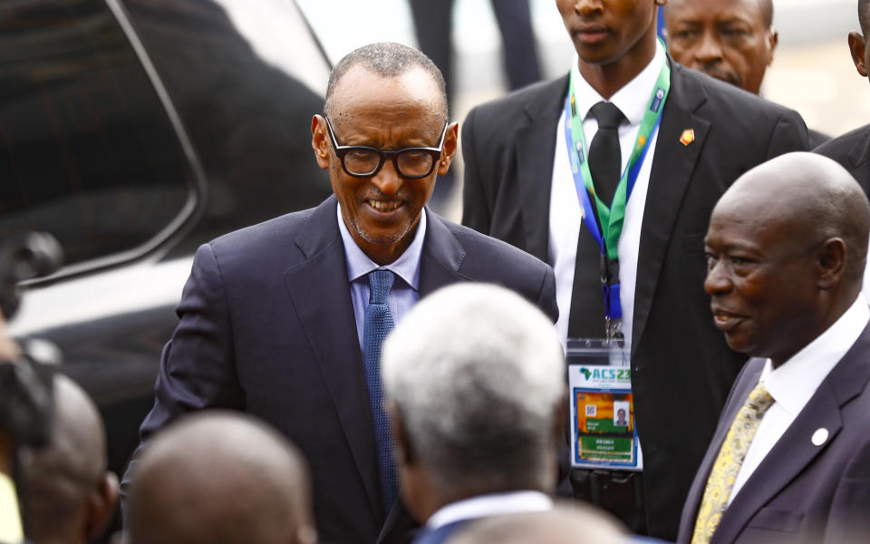 Paul Kagame, center, President of the Republic of Rwanda, arrives at Kenyatta International Conference Centre in Nairobi, Kenya Tuesday, Sept. 5, 2023, for the Africa Climate Summit. On the right is Kenya's Deputy President, Rigathi Gachagua. (AP Photo/Brian Inganga)