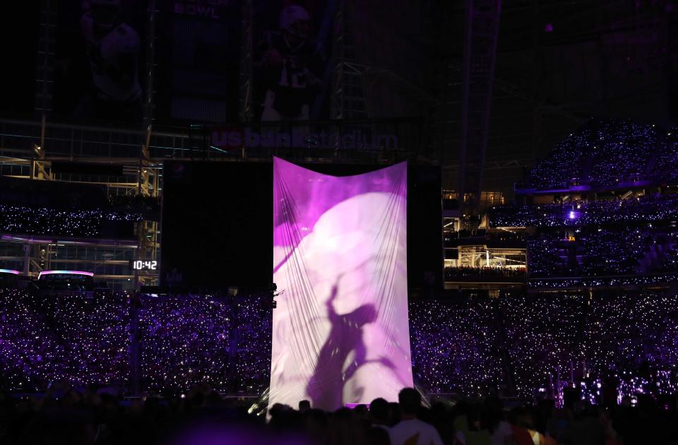 <p>Justin Timberlake performs during the halftime show as a projection of the late singer Prince is shown. REUTERS/Chris Wattie </p>