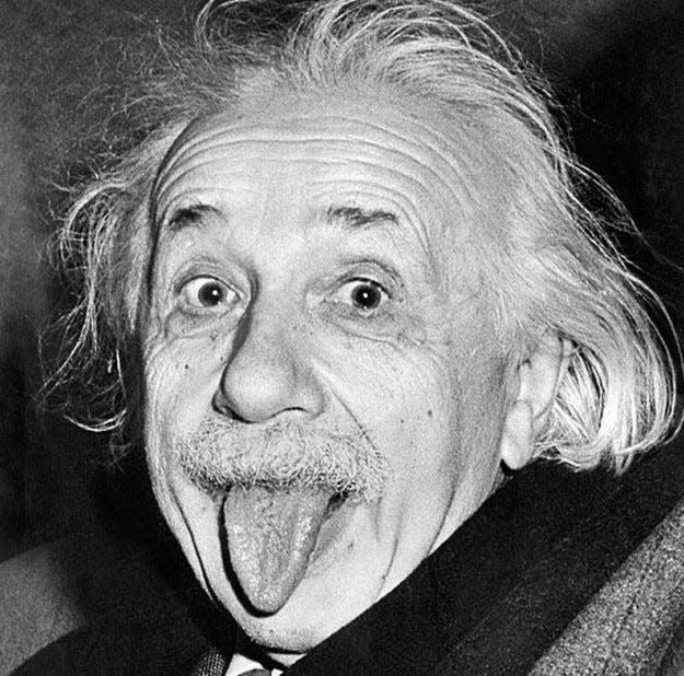 Einstein's signed copy of this photo, taken in 1951, was sold at RR Auction in 2014. The photo featured his signature and lines written in German: "This gesture you will like, because it is aimed at all of humanity."