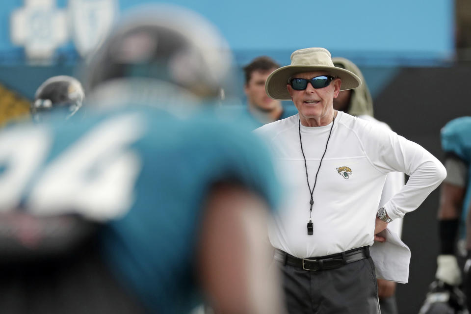 FILE - Tom Coughlin Executive Vice President of Football Operations watches players during a practice at NFL football training camp, Tuesday, July 31, 2018, in Jacksonville, Fla. Coughlin, the first coach in the history of the Jaguars, will be inducted into the franchise’s ring of honor next season. He will become the seventh member of the “Pride of the Jaguars” during a yet-to-be-determined home game in 2024. (AP Photo/John Raoux File)