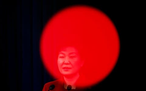 South Korea's now-disgraced ex-President Park Geun-Hye addressing the nation in 2016 - Credit: Kim Hong-ji/AFP