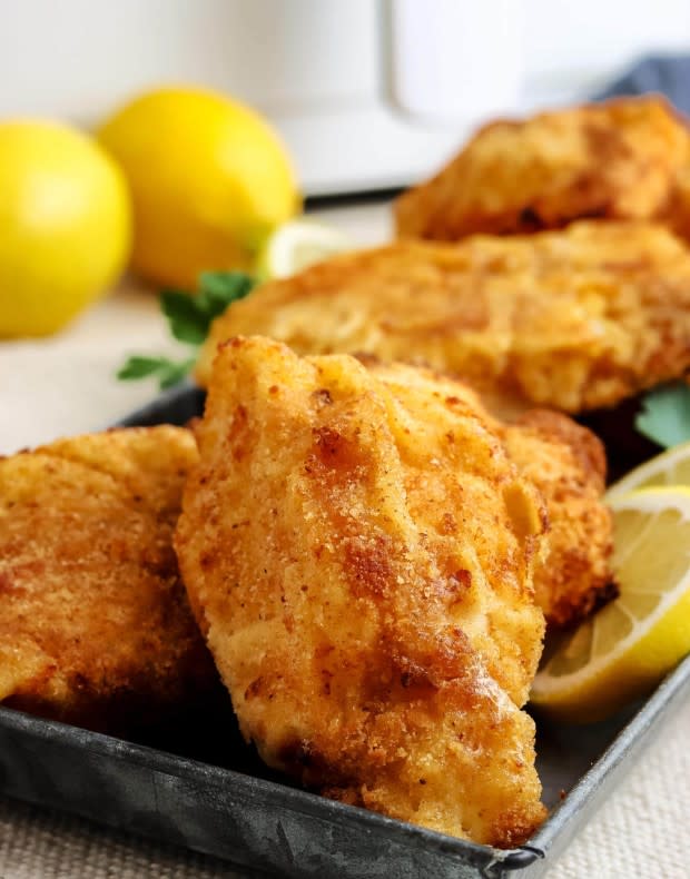 <p>Air Fryer Fanatics</p><p>Make the best air fried fish that is also easy to make gluten-free too!</p><p><strong>Get the recipe: <a href="https://airfryerfanatics.com/air-fried-fish-gluten-free-air-fryer/" rel="nofollow noopener" target="_blank" data-ylk="slk:Air Fryer Fried Fish;elm:context_link;itc:0;sec:content-canvas" class="link ">Air Fryer Fried Fish</a></strong></p>