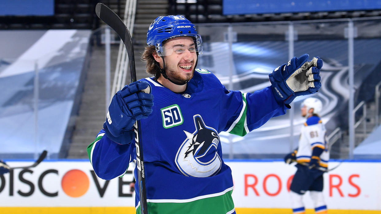 EDMONTON, ALBERTA - AUGUST 21: Quinn Hughes #43 of the Vancouver Canucks reacts after teammate Jay Beagle #83 scored in the first period of Game Six of the Western Conference First Round of the 2020 NHL Stanley Cup Playoff between the St. Louis Blues and the Vancouver Canucks at Rogers Place on August 21, 2020 in Edmonton, Alberta. (Photo by Andy Devlin/NHLI via Getty Images)