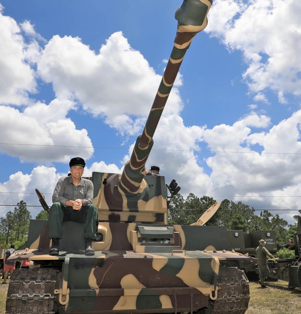 Marc Kovacs sits on a replica of a German Tiger tank. The Tiger tank was on display at the Volusia County fairgrounds during Volusia Valor Days on Saturday and Sunday.