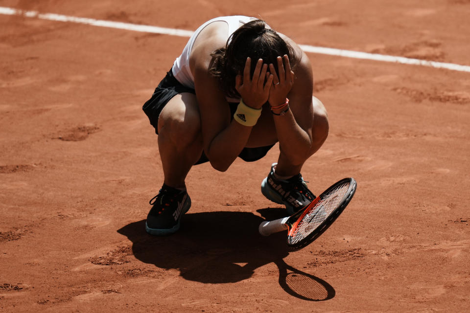 Russia's Daria Kasatkina reacts as she defeats Russia's Veronika Kudermetova during their quarterfinal match of the French Open tennis tournament at the Roland Garros stadium Wednesday, June 1, 2022 in Paris. Kasatkina won 6-4, 7-6 (7/5). (AP Photo/Thibault Camus)