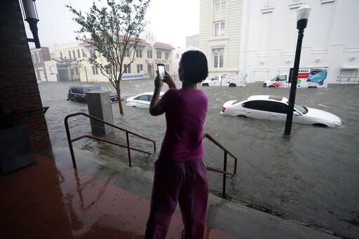 Downtown Pensacola has more than three foot of floodwater in its streetsAP