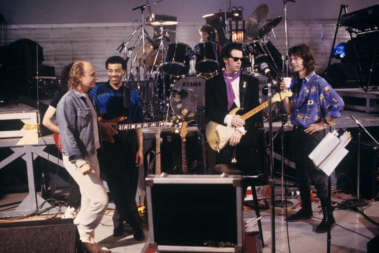 (MANDATORY CREDIT Ebet Roberts/Getty Images) (L-R) Joe Satriani (hidden), Mick Brigden, Doug Wimbish,  Simon Phillips (drums), Jimmy Rip and Mick Jagger rehearse for Mick Jagger's solo tour at SIR Studios in New York City on February 20, 1988. (Photo by Ebet Roberts/Redferns)