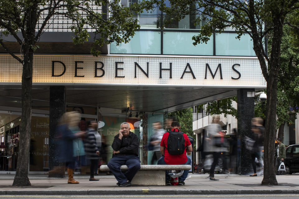 Members of the public walk past a Debenhams store on Oxford Street, London. Photo: Dan Kitwood/Getty Images