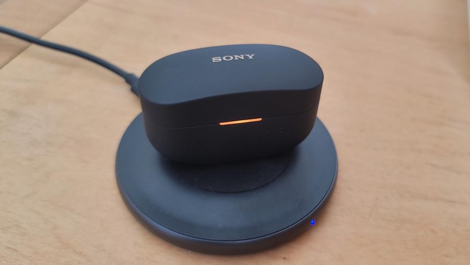 The Sony WF-1000XM4 being wirelessly charged