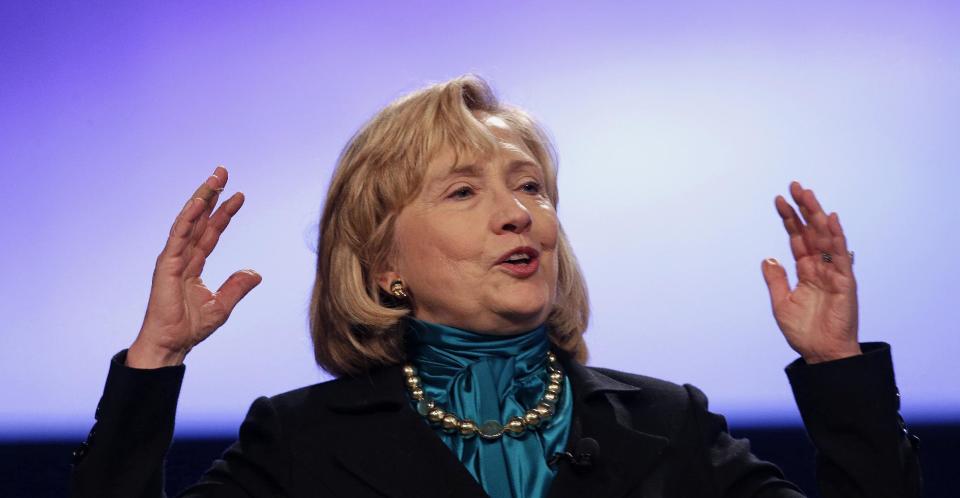 Former Secretary of State Hillary Rodham Clinton speaks to the National Automobile Dealers Association meeting in New Orleans, Monday, Jan. 27, 2014. (AP Photo/Gerald Herbert)