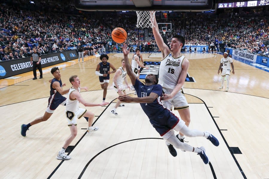 COLUMBUS, OHIO – MARCH 17: Heru Bligen #3 of the Fairleigh Dickinson Knights shoots over Zach Edey #15 of the Purdue Boilermakers during the first half in the first round of the NCAA Men’s Basketball Tournament at Nationwide Arena on March 17, 2023 in Columbus, Ohio. (Photo by Andy Lyons/Getty Images)