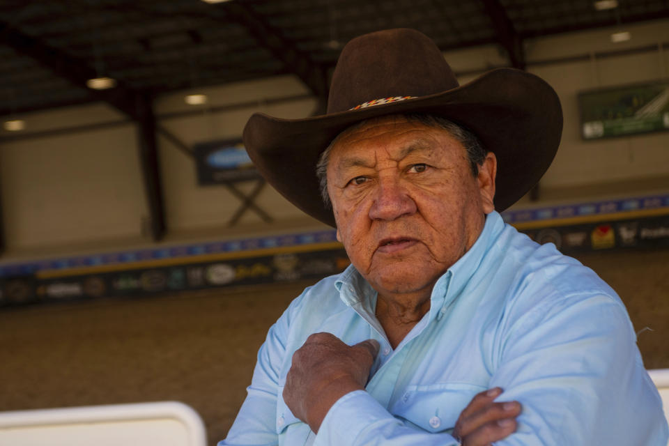 Kennard Real Bird poses for a photo, Friday, Dec. 9, 2023, in Las Vegas. Kennard Real Bird poses for a photograph, Friday, Dec. 9, 2023 in Las Vegas. For Kennard, who rode saddle broncs for 16 years, horses provided freedom and the ability to move around the thousands of square miles that make up the Crow reservation. Born out of necessity and in mastering skills that came as horses transformed hunting, travel and warfare, rodeo has remained popular in Native American communities. (AP Photo/Ty O'Neil)