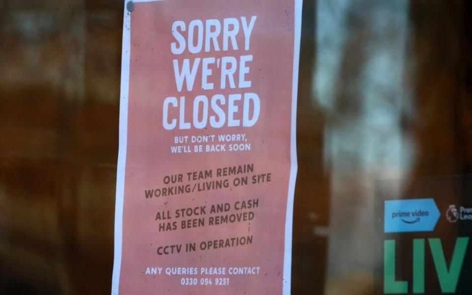 A closed sign at a UK bar - Getty