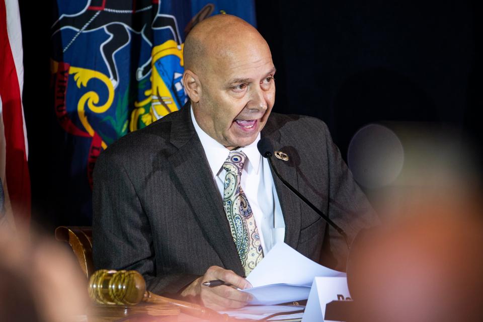 <p>Pennsylvania State Senator Doug Mastriano speaks at a public hearing on Donald Trump’s baseless allegations of voter fraud on 25 November</p> (EPA)